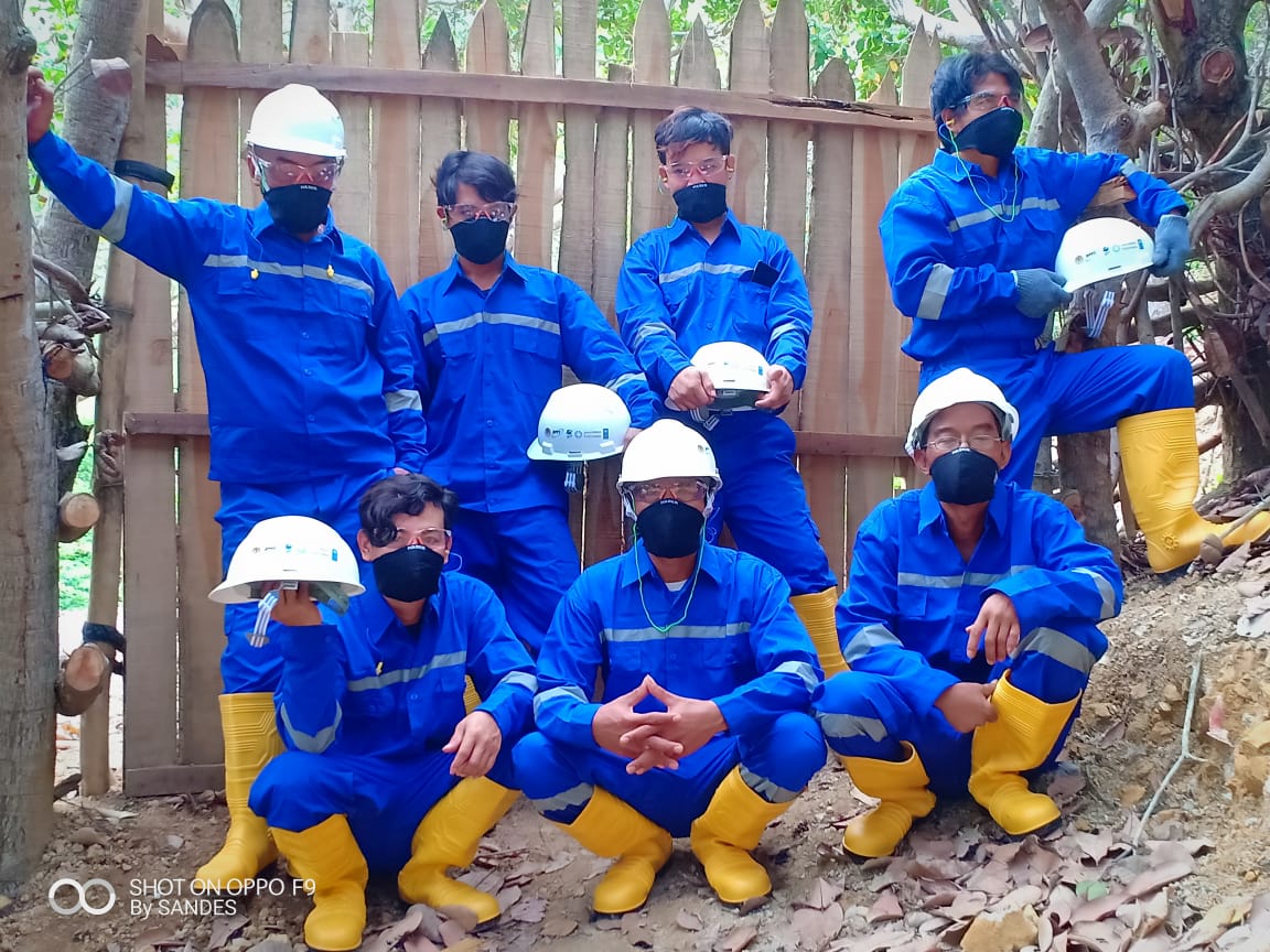 Miners in West Lombok, Indonesia using PPE at mining location