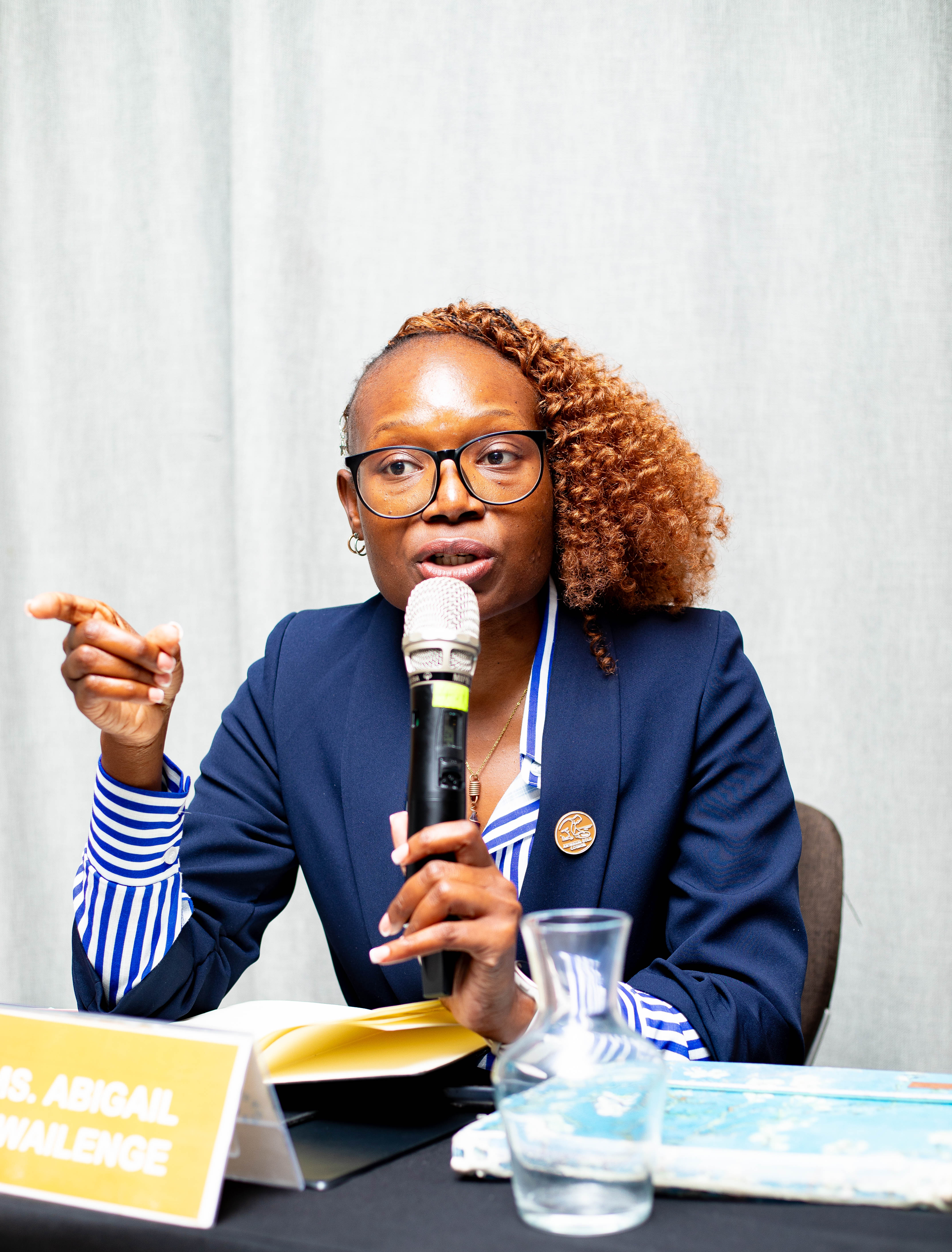 Ms. Abigail Mwailenge delivering an overview of what the planeGOLD Zambia Project has done at the NASGM Extra-Ordinary Meeting