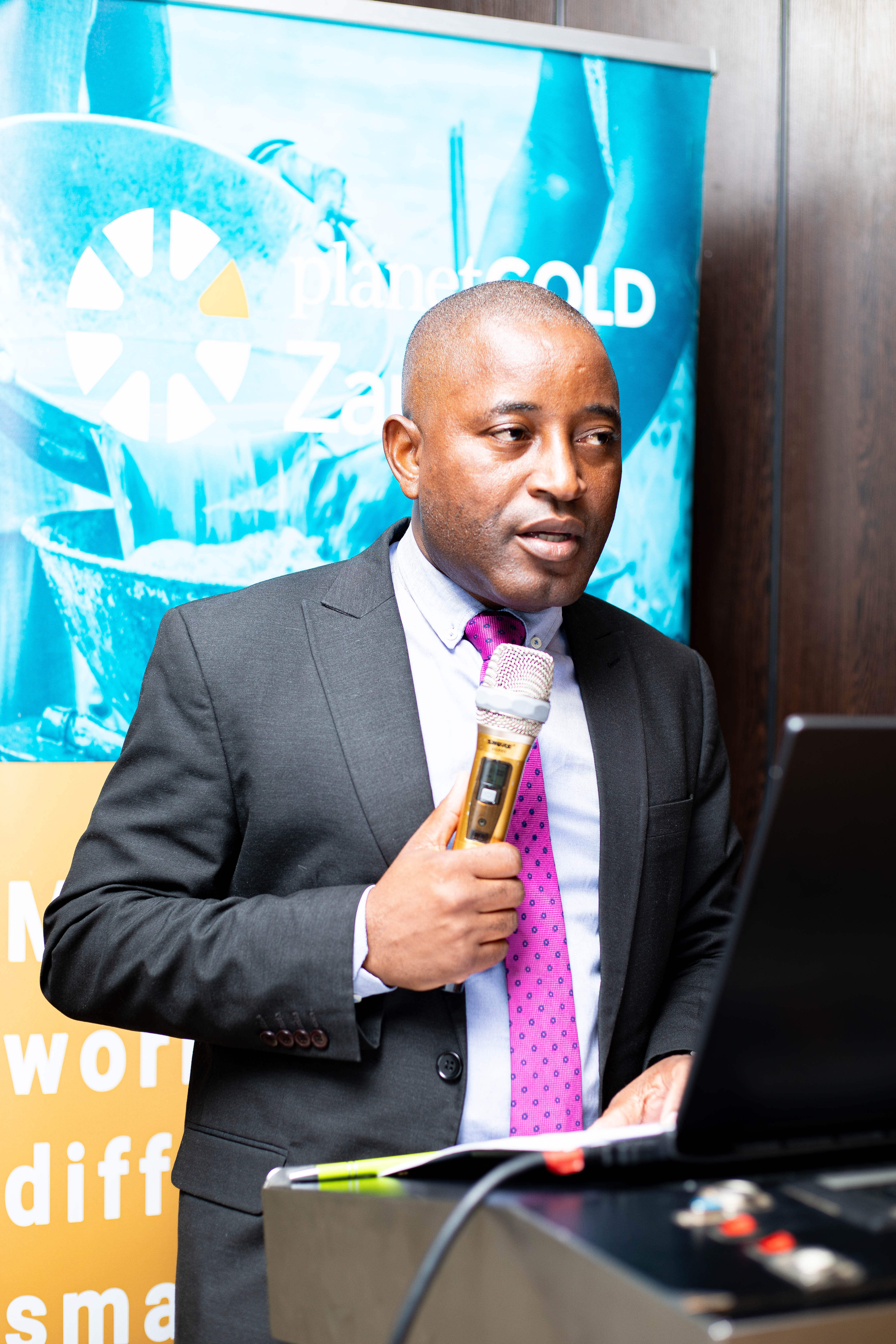 Acting Director General of the Zambia Environmental Management Agency Mr. Christopher Kanema giving his opennining Remarks at the NAC second quarter review meeting