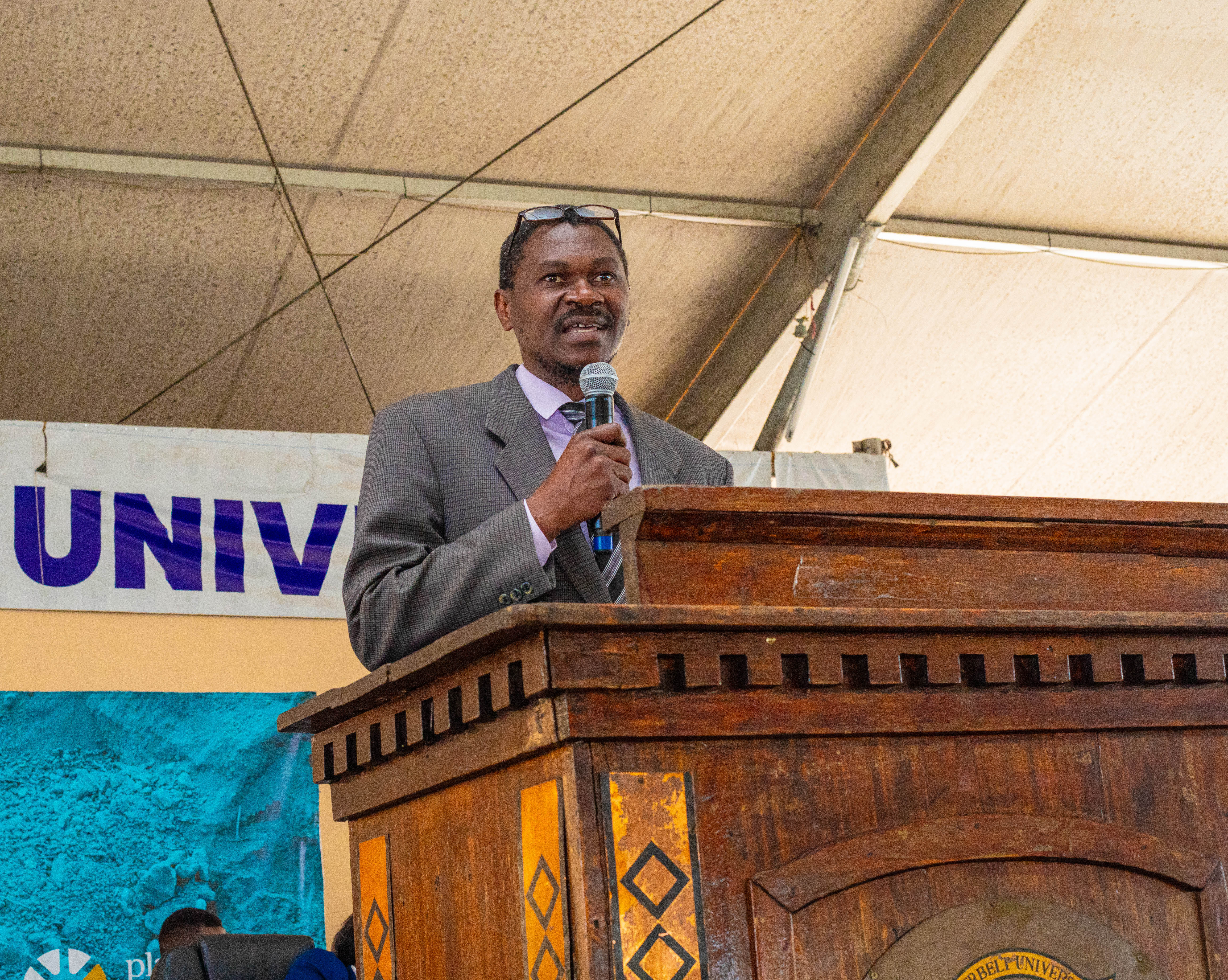 Dr. Levi Mutambo delivering opening remarks, highlighting the importance of responsible mining and academic collaboration