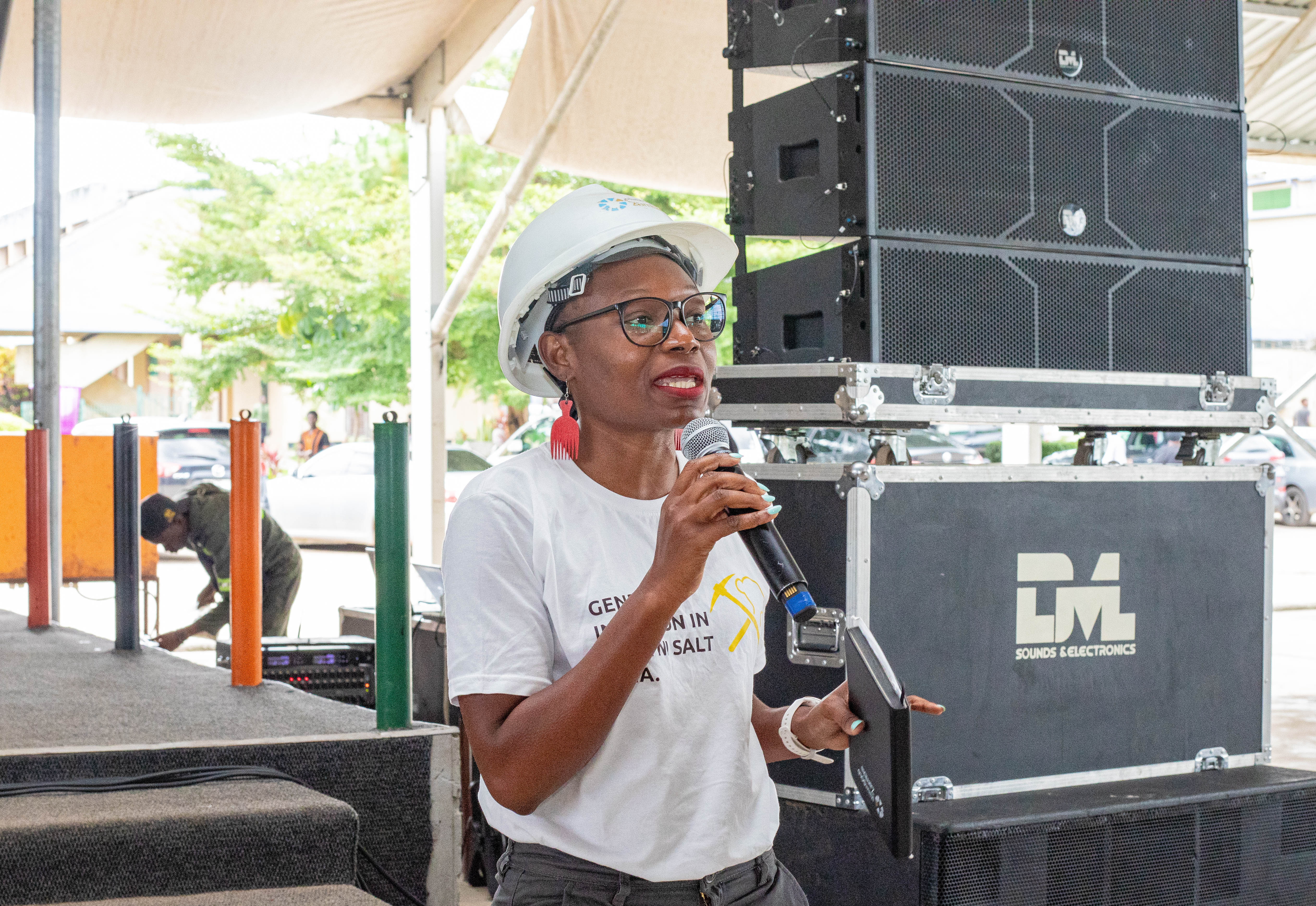 Ms. Abigail Mwailenge delivering an overview of the planeGOLD Zambia Project at CBU during the public lecture