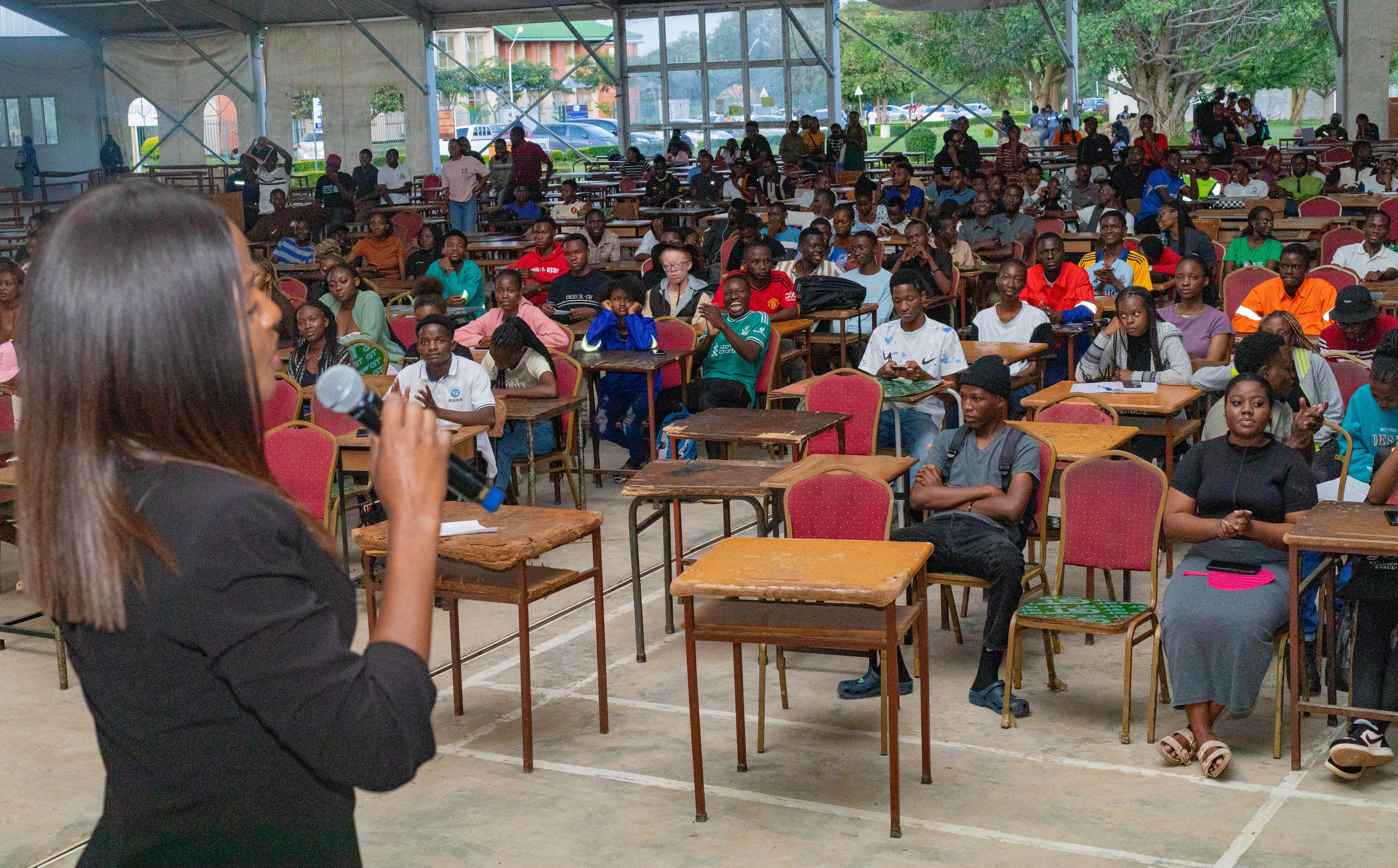 Dr. Tina Chanda encouraging students to participate in sustainable development initiatives within the mining sector