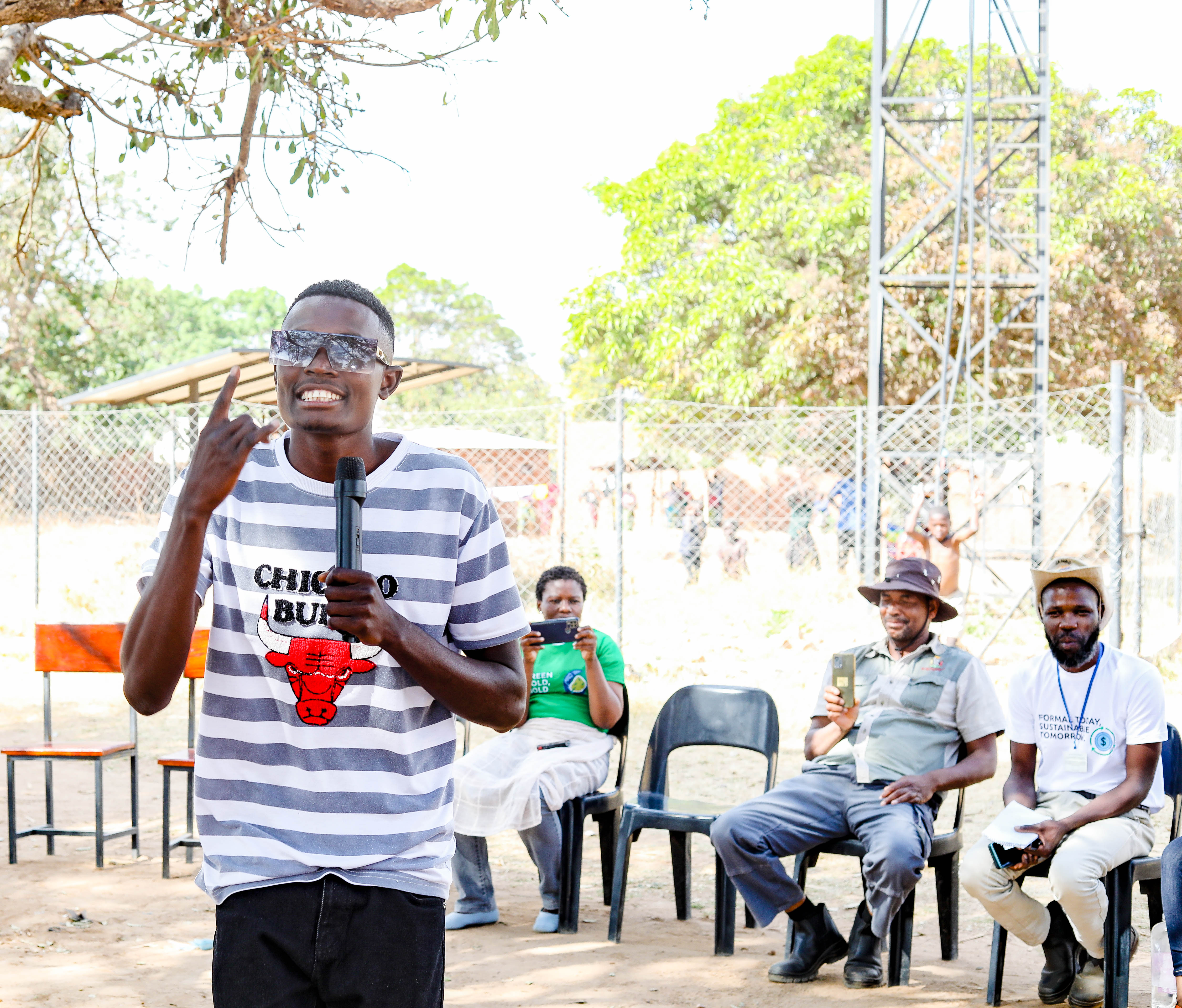 Henry Mhone (stage name Baxter) performing a song on ASGM Awareness in Vubwi District