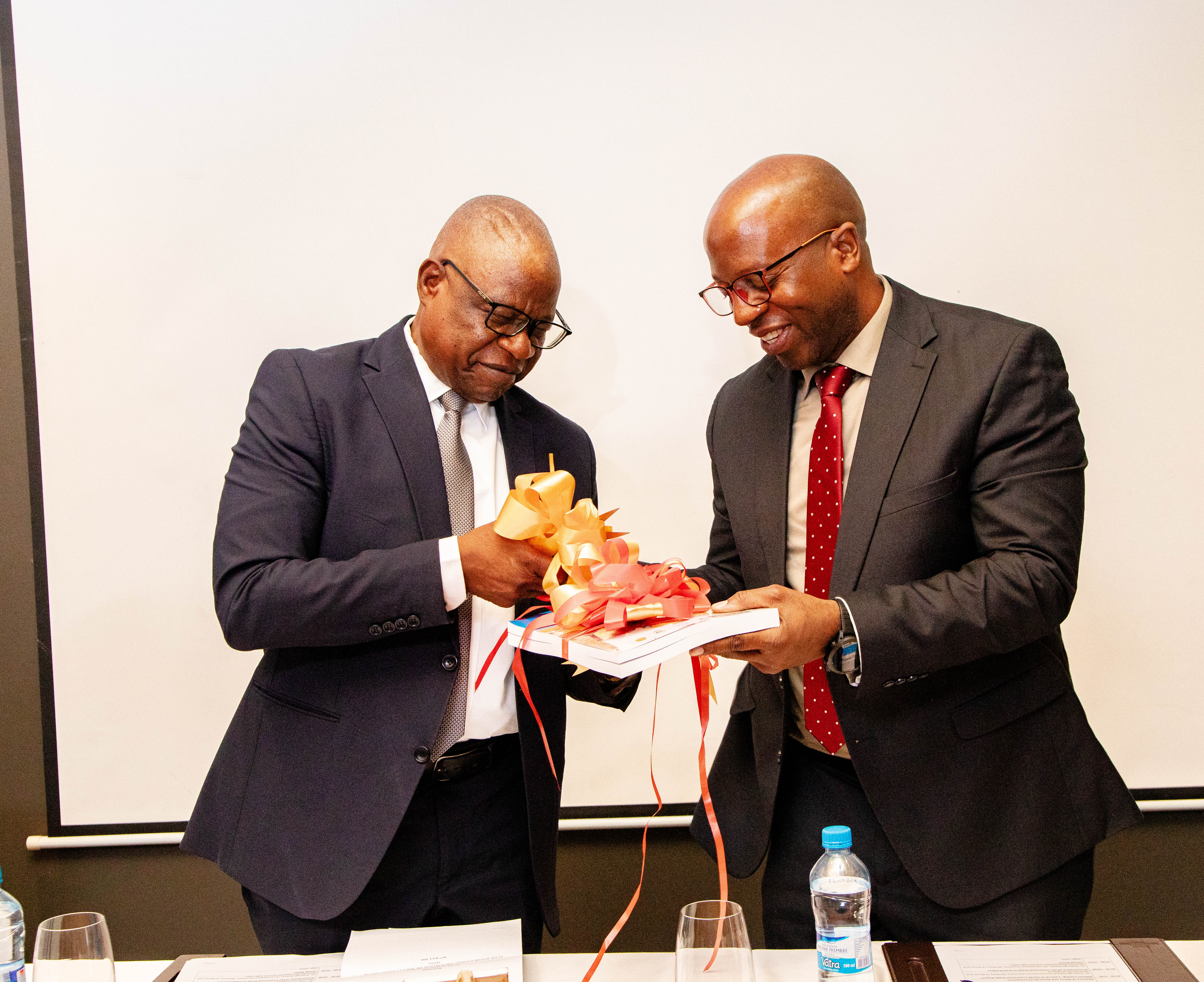 Parmenent Secretary for the Ministry of Mines and Minerals Development and Permanent Secretary for the Ministry of Green Economy and Environment Cutting the ribbon during the launch of the Contextual Study