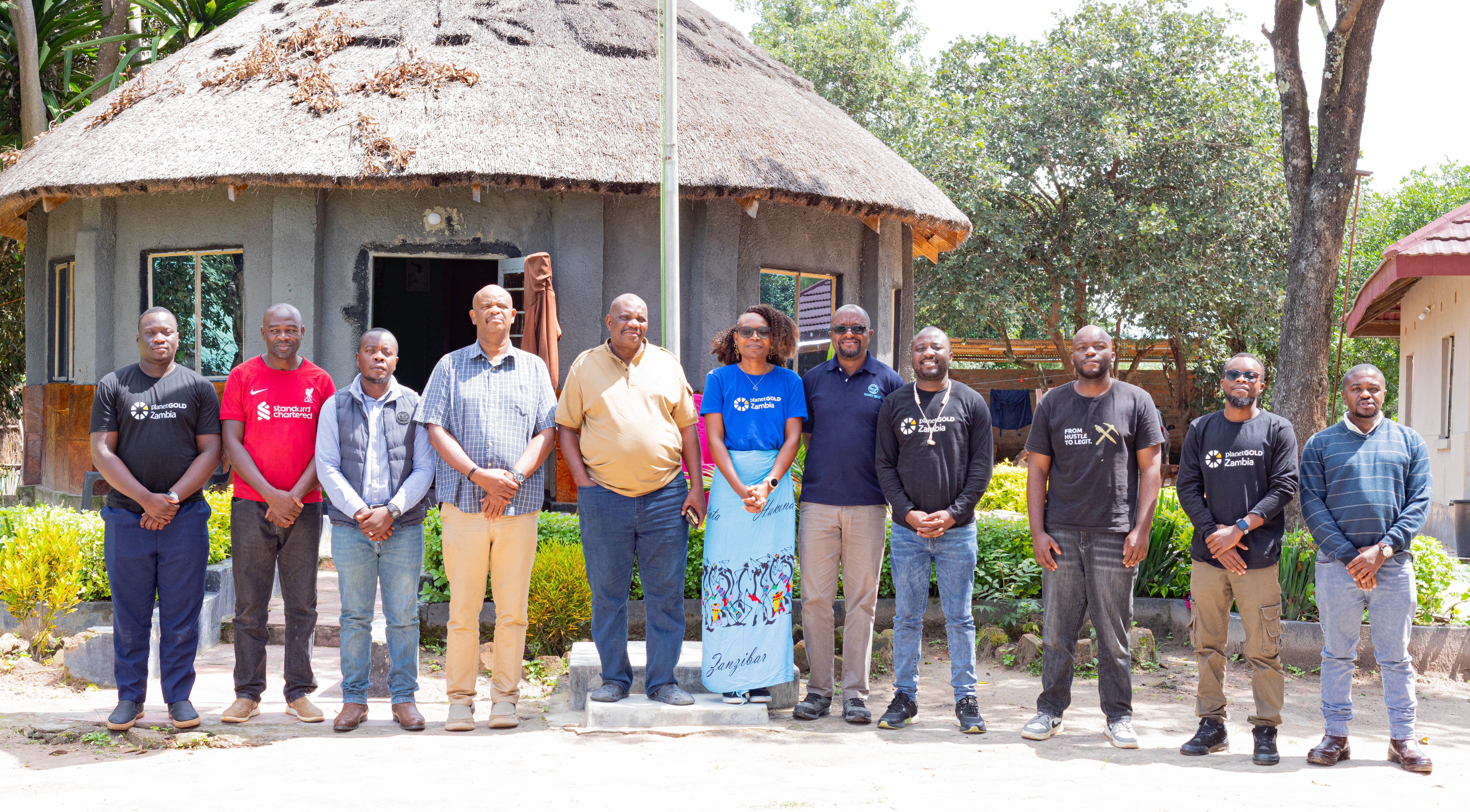 The planetGOLD Zambia Project team and key stakeholders pose for a group photo with Chief Mukwikile following a successful engagement at Chief Mukwikile's Palace