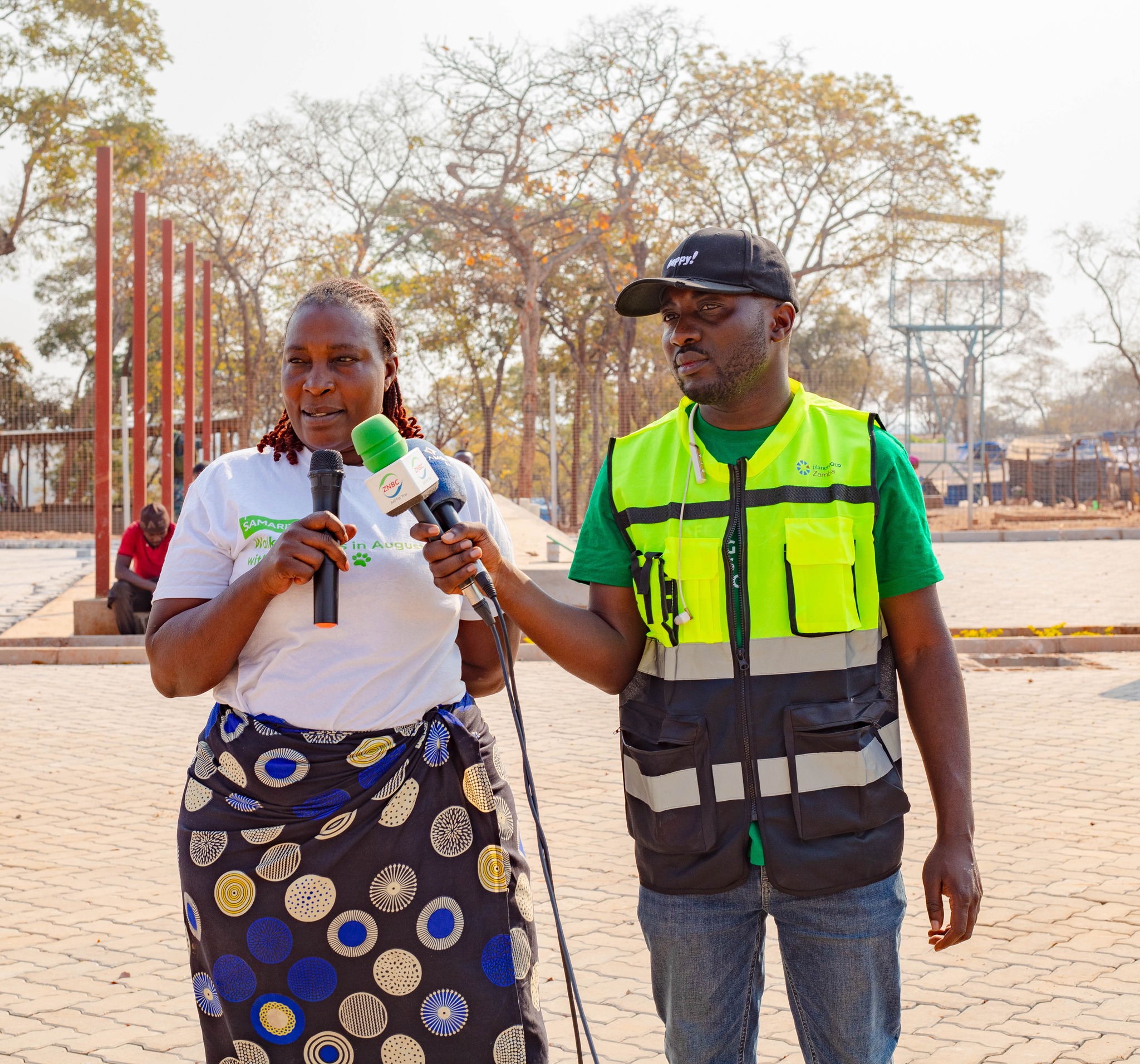 A woman miner addressing the media 
