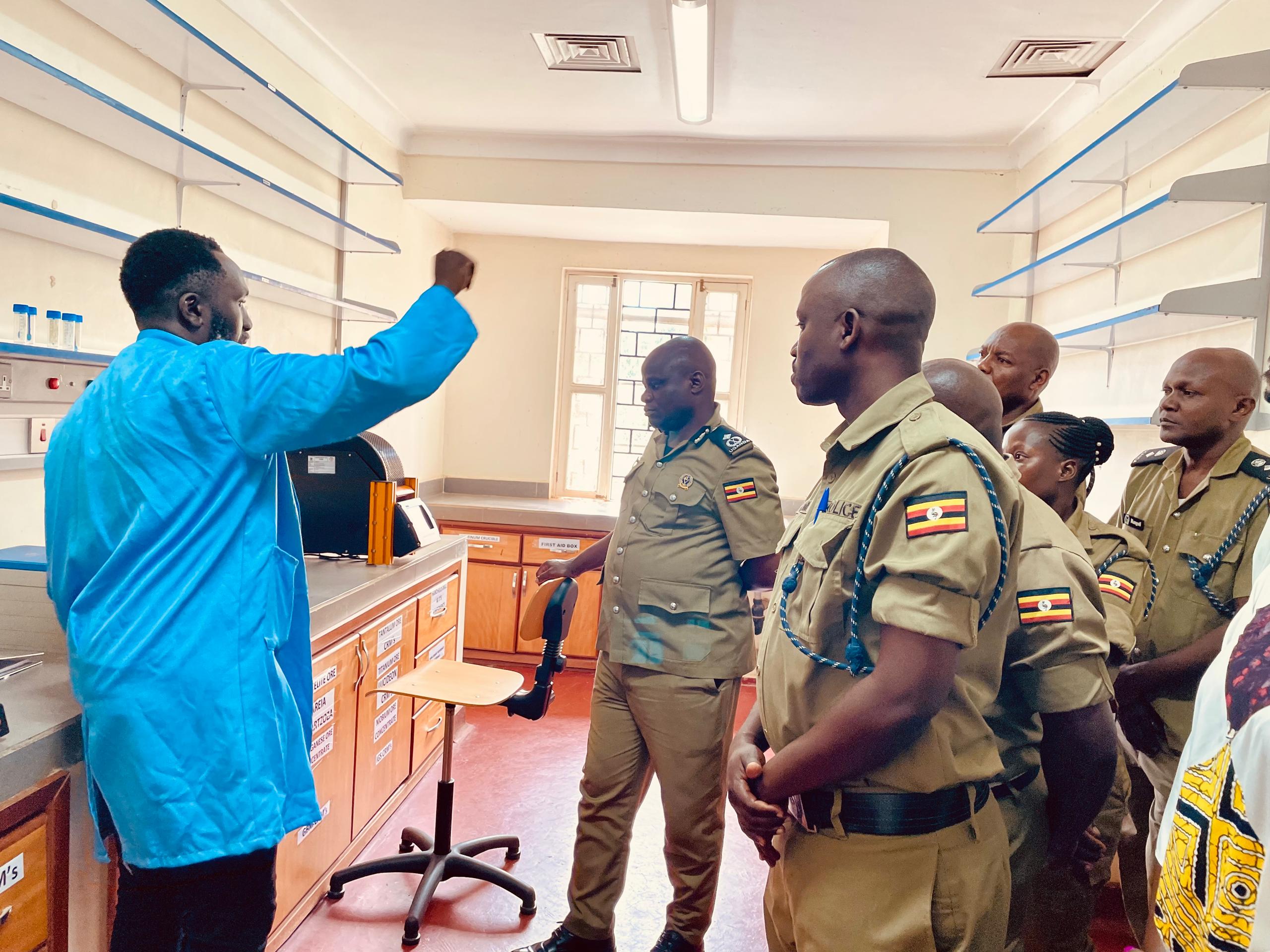 Police officers tour the government Geological Survey Laboratory 