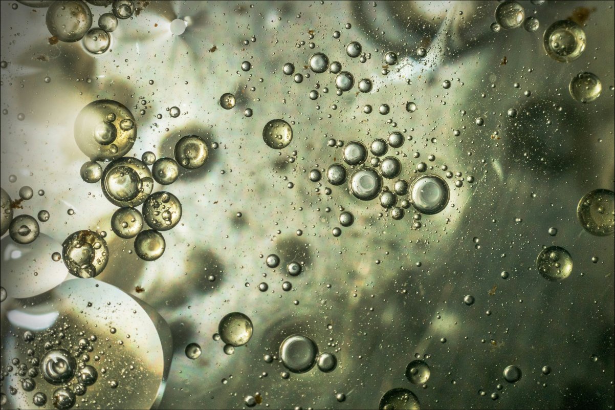 A green surface with small bubles