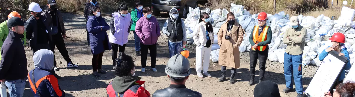 Artisanal miners learning about OSH risks at the mining site