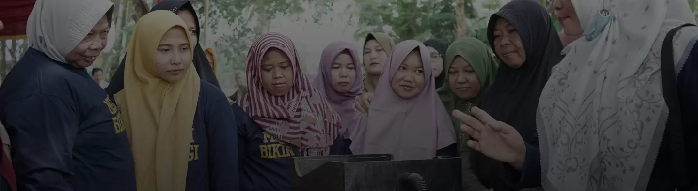 Photo of women in training on gold cube equipment