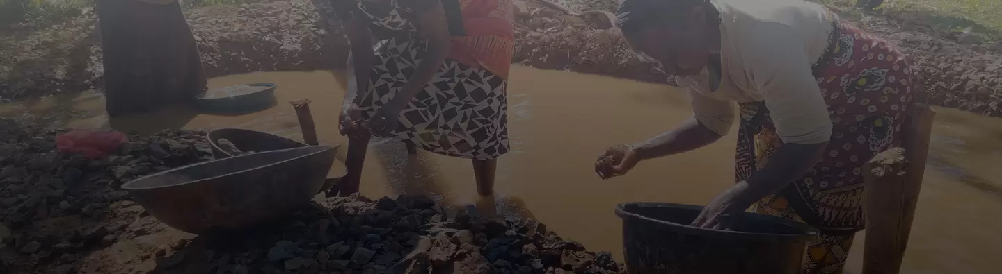 Women at Ikolomani, Kakamega County Separating ore from waste