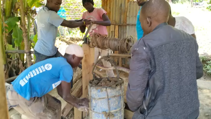 Miners of Banana group in Kakamega county retriving ore from their shaft