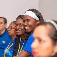 Mujer minera de Cauca sonrie en conversatorio inclusion financiera 