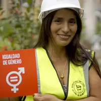 Person holding SDG 5 sign