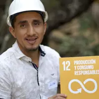 Miner with SDG 12 sign