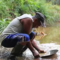 A barequero, or gold panner, in Colombia