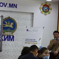 Mongolia local environment department head giving remarks at training