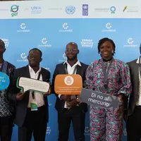 Group photo with signs