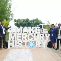 People with Make Mercury History sign