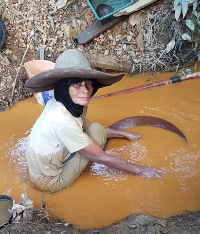 Rosna - female miner from Hulawa Village, North Gorontalo, Indonesia