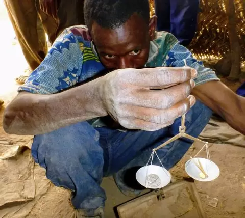 Gold Buyer, Burkina Faso Photo: Kevin Telmer, AGC