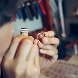 goldsmith holding rings