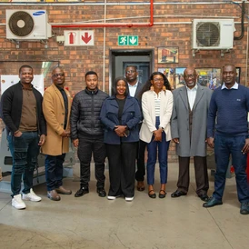 The planetGOLD Zambia Project Team and other key stakeholders posing for a group photo in South Africa