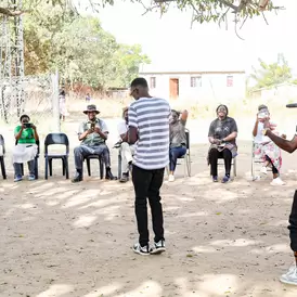 The Big Team Music performing one their songs during an engagement