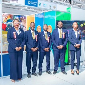 The planetGOLD Zambia Project Team posing for a photo at the Agricultural and Commercial Show Stand