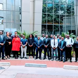 Financial institutions, stakeholders and the planetGOLD Team posing for photo after a succesful meeting