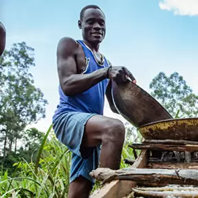 Kenyan miner with pan