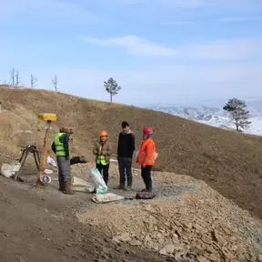 Miners by a secured shaft, Bulag-1 site, Selenge province, Mongolia