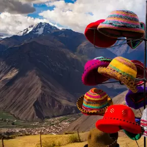 A collection of hats on a hanger