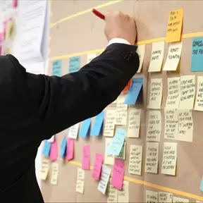 A wall board full of post-it