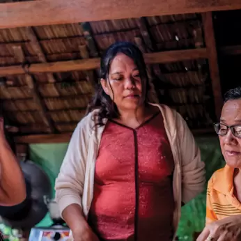 Women with ledger in Philippines