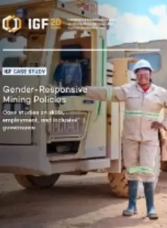 woman miner standing next to truck