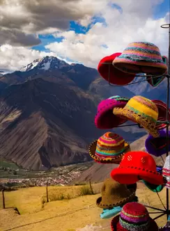 A collection of hats on a hanger