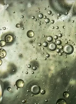 A green surface with small bubles