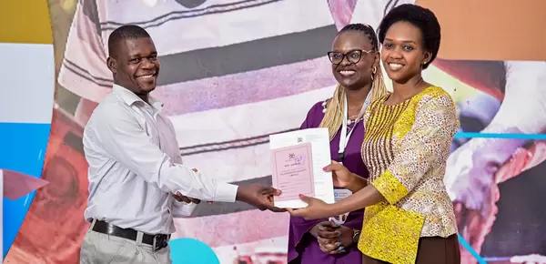 Uganda's newly-registered ASGM mining cooperatives receive certificates from State Ministier for Energy and Mineral Development