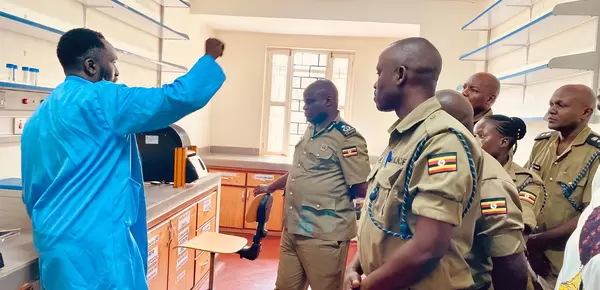 Uganda Police officers tour the government Geological Survey Laboratory 