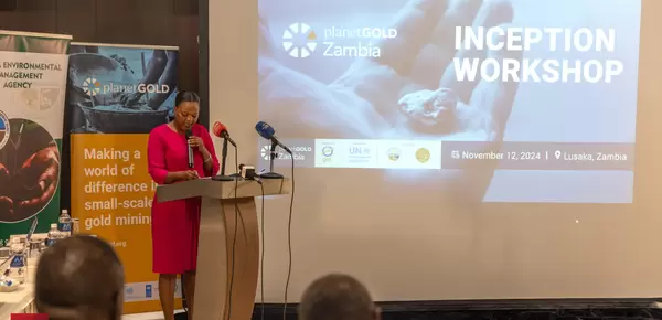 Woman speaking at podium