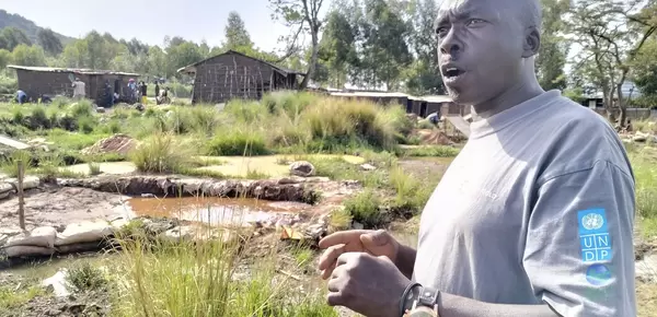 Mr. Jairo, a leader of Upper Meko Group, at their proposed gold processing site
