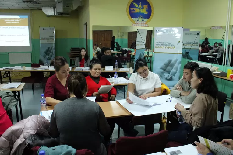 Participants divided into groups brainstorming on local level activities and plans, Mandal soum, Selenge