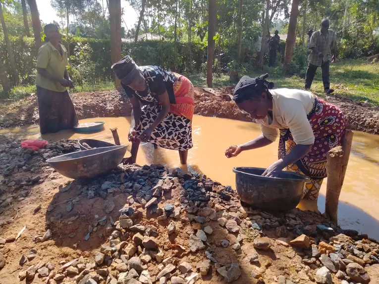 Women at Ikolomani, Kakamega County Separating ore from waste