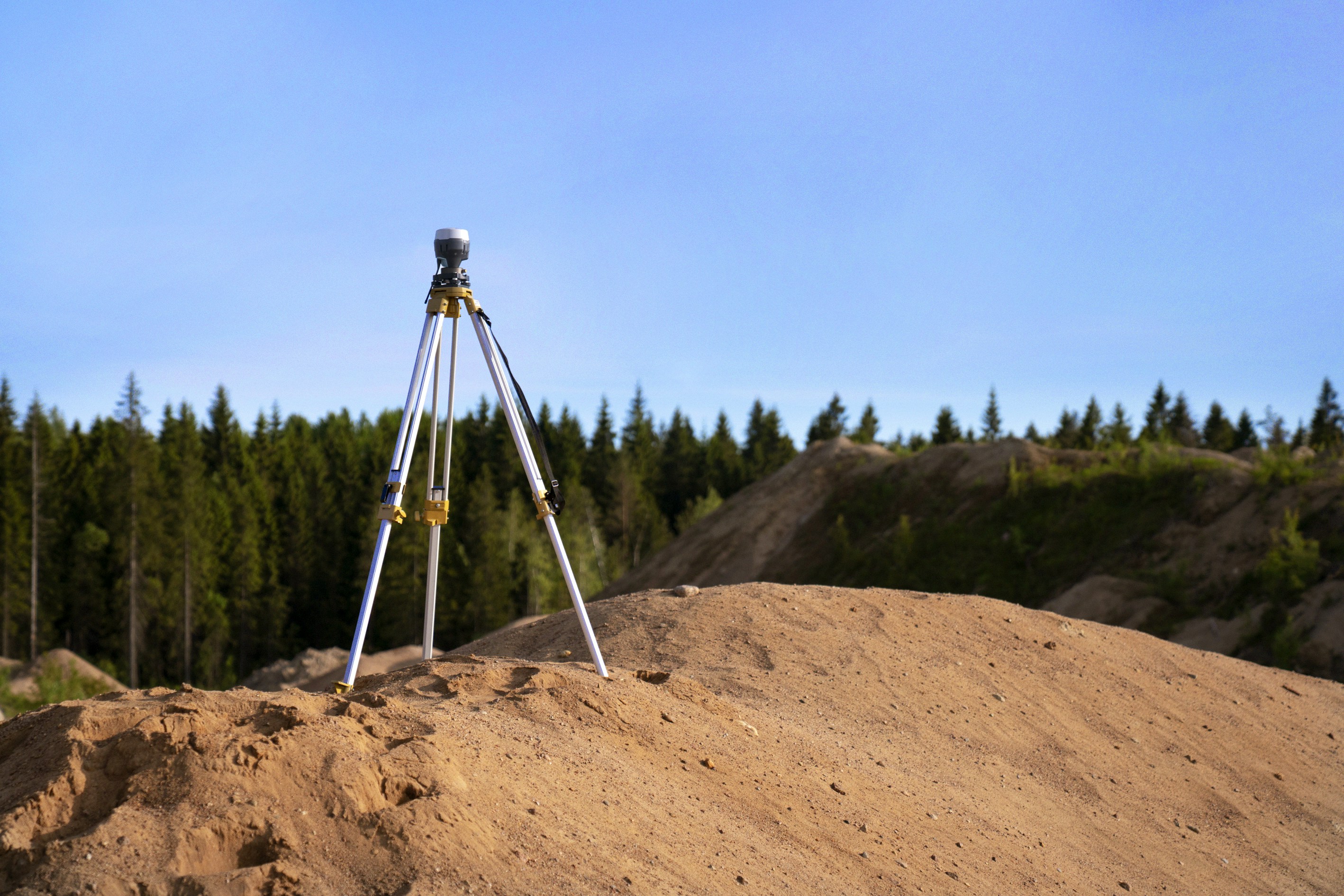 A treepod measuring instrument standing on a hill